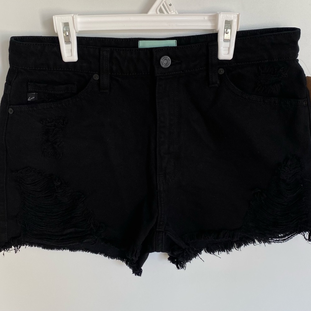Judith March- denim black shorts/ripped with tiger patch on one back pocket